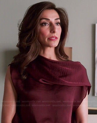 Delia's burgundy draped neck blouse on Girlfriends Guide to Divorce
