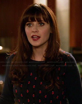 Jess's navy palace guards printed sweater on New Girl