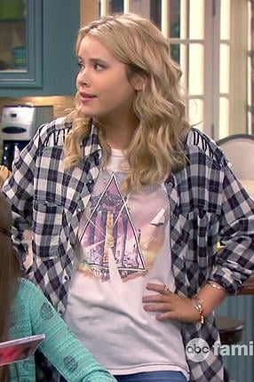 Lennox's plaid shirt with lace up shoulders and triangle graphic tee on Melissa and Joey