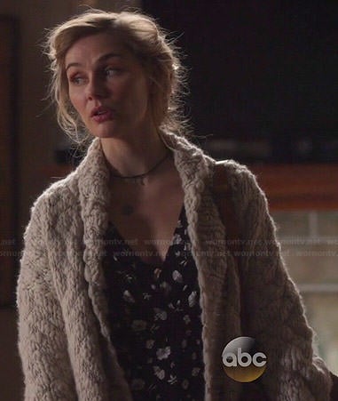 Scarlett's black and white floral dress and chunky knit cardigan on Nashville
