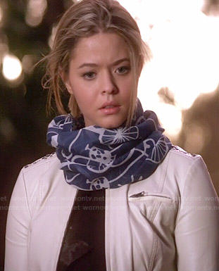 Ali's white leather jacket with lace up sleeves and blue bicycle print scarf on Pretty Little Liars