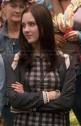 Brenna's grey checked dress and black crochet trim jacket on Chasing Life