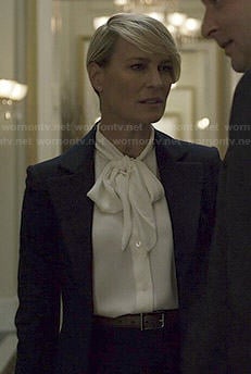 Claire's white neck bow blouse and navy blazer on House of Cards