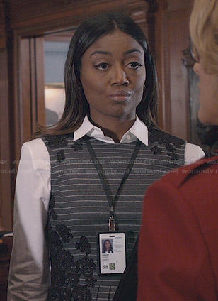 Daisy's striped peplum top with floral applique on Madam Secretary