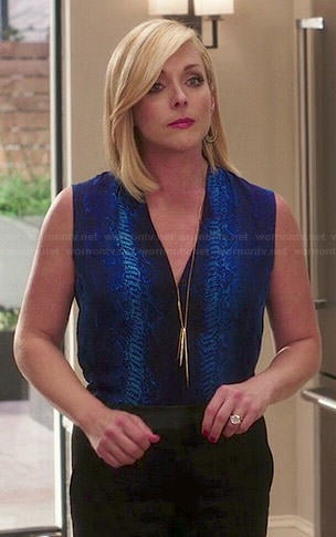 Jacqueline's blue snake print blouse and spike necklace on Unbreakable Kimmy Schmidt