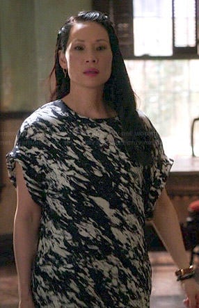 Joan's black and white paint printed t-shirt dress on Elementary