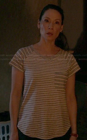 Joan's grey striped tee on Elementary
