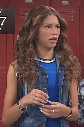 KC's blue contrast trim top and denim vest on KC Undercover