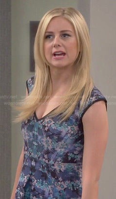 Maddie's blue v-neck kaleidoscope print dress on Cristela