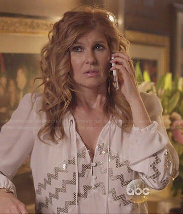 Rayna's white blouse with zig zag sequins on Nashville