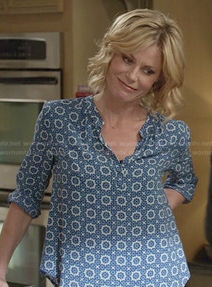 Claire's blue tile printed blouse on Modern Family