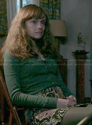 Emma's floral skirt and green cardigan on Bates Motel