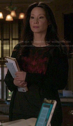 Joan's black/red abstract graphic tee on Elementary