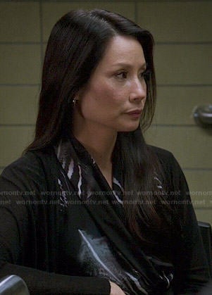 Joan's feather print dress on Elementary