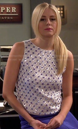 Maddie's white sequin embellished sleeveless top on Cristela