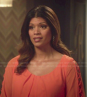 Xiomara's orange lattice-sleeve dress on Jane the Virgin