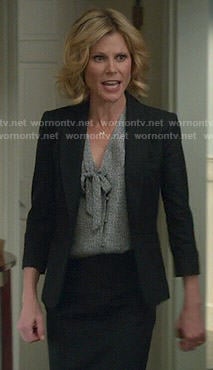 Claire's blue printed tie-neck blouse on Modern Family