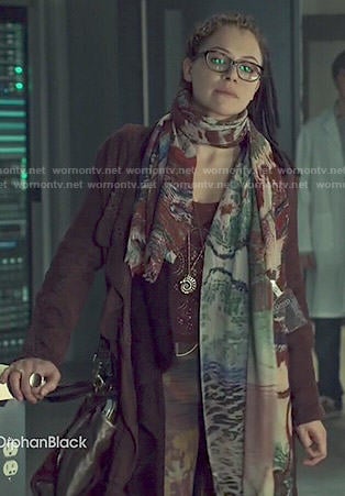 Cosima's long burgundy coat and lace top on Orphan Black