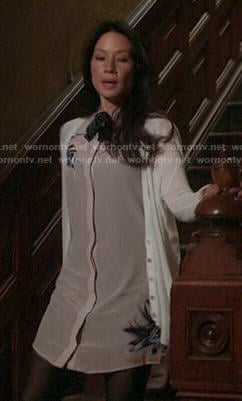Joan's flower printed button front dress on Elementary