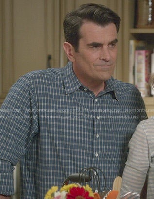 Phil's blue checked shirt on Modern Family