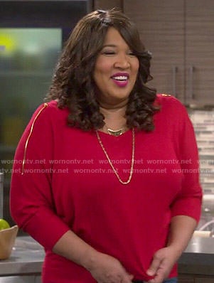Yolanda's red zip-shoulder sweater on Young and Hungry