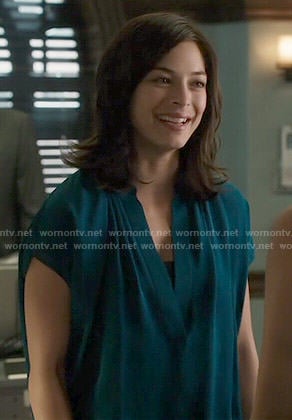 Cat's teal blue v-neck blouse on Beauty and the Beast