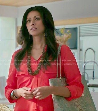 Divya's red button down blouse on Royal Pains
