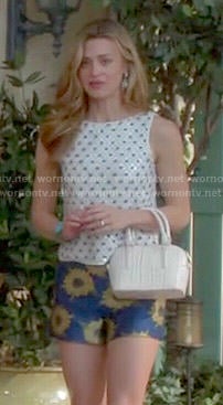 Paige's white sequin top and daisy print shorts on Royal Pains