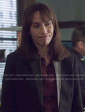 Tess's black coat with leather trim on Beauty and the Beast