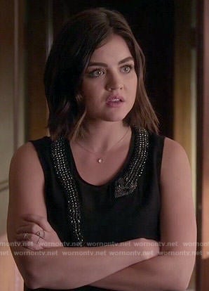 Aria's black top with embellished snake on Pretty Little Liars