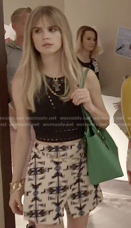 Brooke's black lasercut crop top and printed wrap skirt on Scream