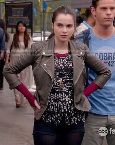 Bay's black and white printed fringed top and leather jacket on Switched at Birth