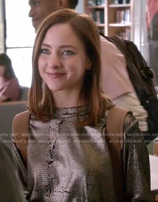 Brenna's metallic sweatshirt on Chasing Life