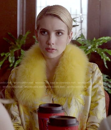 Chanel's yellow floral coat and pleated dress on Scream Queens