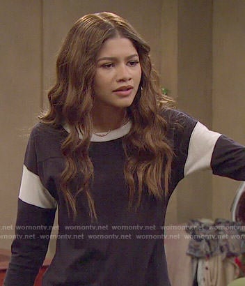KC's navy tee with white striped sleeves on KC Undercover