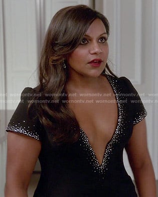 Mindy's black deep v-neck dress with embellished trim on The Mindy Project