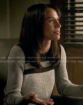 Tess's grey sweater with black panels on Beauty and the Beast