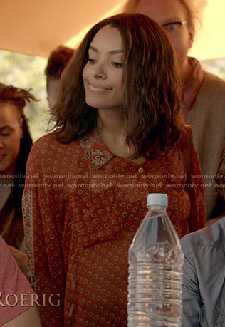 Bonnie's sheer orange printed shirt on The Vampire Diaries