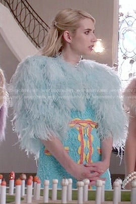 Chanel's turquoise crop top and skirt with orange trim on Scream Queens