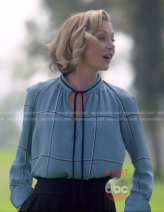 Elizabeth's blue checked tie-neck blouse on Scandal
