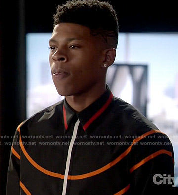 Hakeem's black shirt with orange stripes on Empire