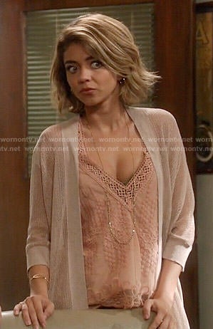 Haley's pink lace v-neck top on Modern Family