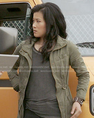 Happy's green drawstring jacket on Scorpion