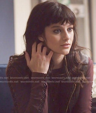 Layla's burgundy long sleeved top with leather stitched sleeves on Nashville