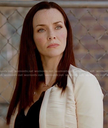 Lily's white leather jacket and rectangle necklace on The Vampire Diaries