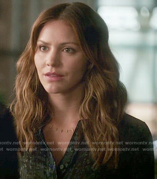 Paige's dark green printed blouse on Scorpion