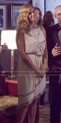 Rayna's white studded draped dress on Nashville