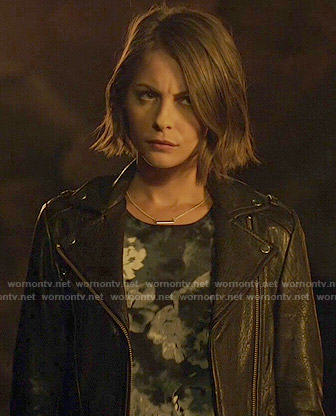 Thea's dark floral top and leather jacket on Arrow
