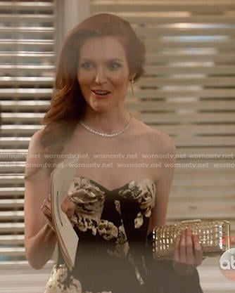 Abby's black and gold strapless gown on Scandal