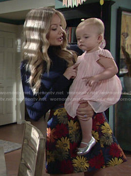 Abby's floral skirt and navy blue turtleneck on The Young and the Restless